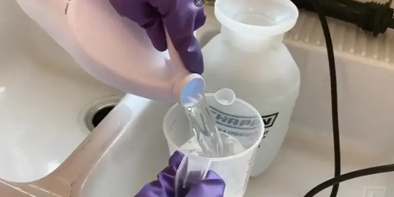 Filling a Chapin 20075 bleach sprayer in the sink