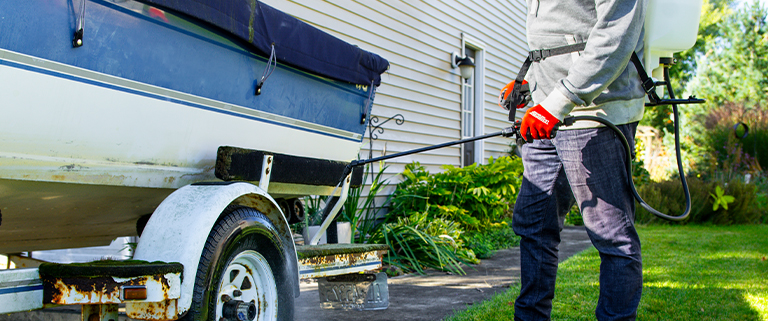 Cleaning a boat with Chapin's 60175 backpack sprayer