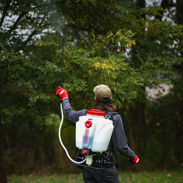 Chapin 63950 Mixes on Exit 4 Gallon Backpack Sprayer spraying trees