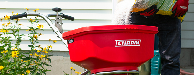 Filling Chapin spreader with fertilizer