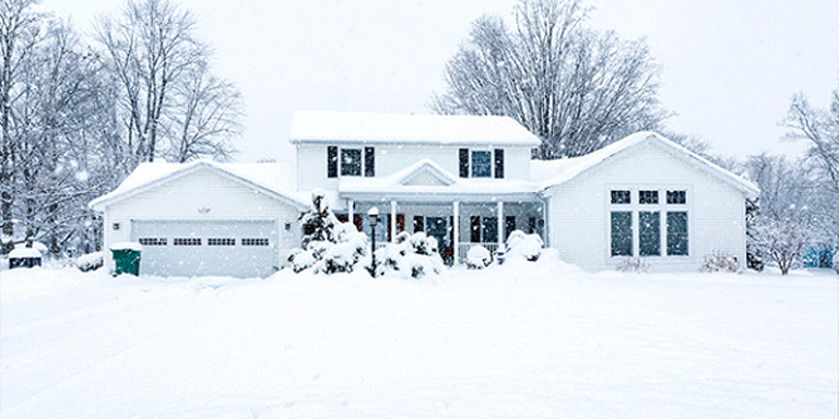 House in winter covered in snow