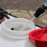 Chapin 97301 15 gallon ATV sprayer filling with water