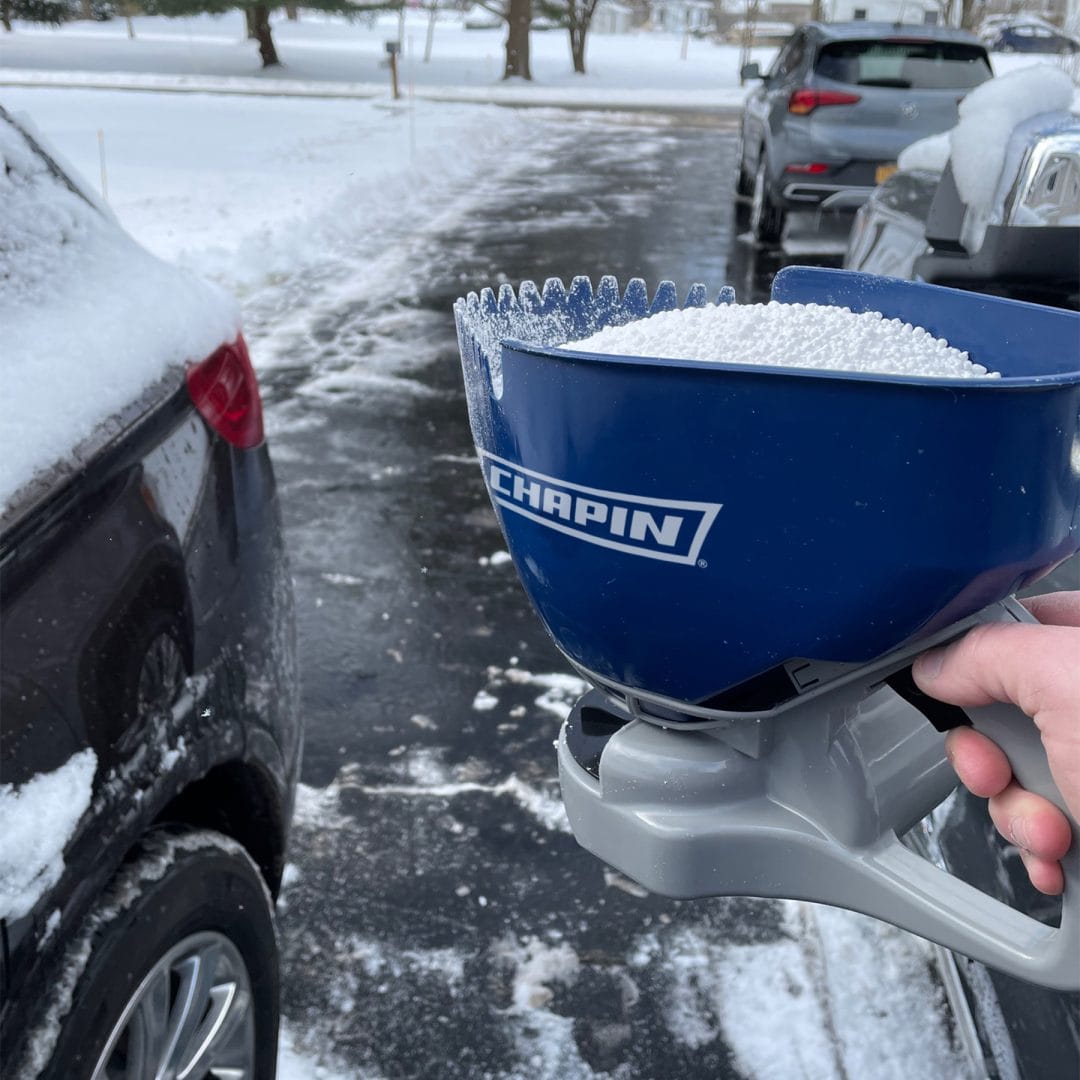 8705a_use Chapin 8705A 3 Liter hand crank ice melt & salt spreader spreading ice melt around vehicles